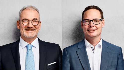 Zwei Männer in Anzug - zum Blogbeitrag: Sanierungsarbeitsrecht von Schultze & Braun unter neuer Führung